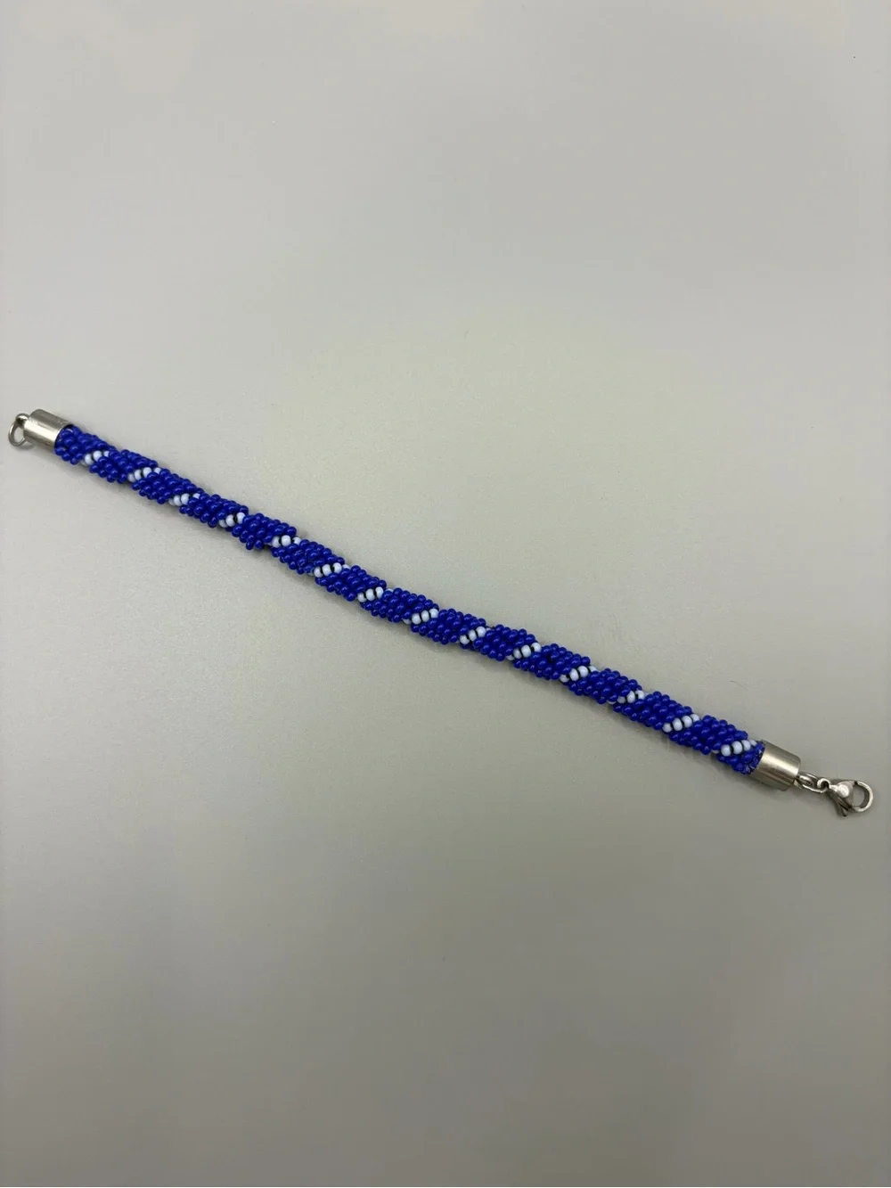 Blue and White Spiral Beaded Bracelet with Silver Clasp